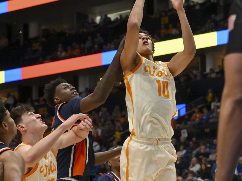 Mar 12, 2026; Nashville, TN, USA;  Tennessee Volunteers forward Nate Ament (10) lays the ball in against the Auburn Tigers during the first half at Bridgestone Arena. Mandatory Credit: Steve Roberts-Imagn Images