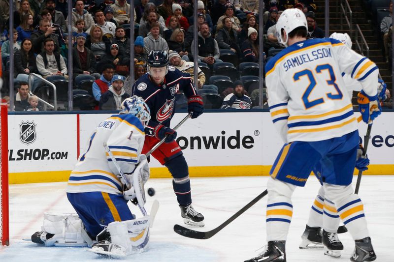 Jan 3, 2026; Columbus, Ohio, USA; Columbus Blue Jackets center Charlie Coyle (3) looks for a rebound of a Buffalo Sabres goalie Ukko-Pekka Luukkonen (1) save during the second period at Nationwide Arena. Mandatory Credit: Russell LaBounty-Imagn Images