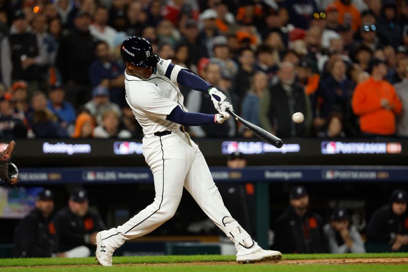 Oct 10, 2024; Detroit, Michigan, USA; Detroit Tigers outfielder Justyn-Henry Malloy (44) hits a double in the ninth inning against the Cleveland Guardians during game four of the ALDS for the 2024 MLB Playoffs at Comerica Park. Mandatory Credit: Rick Osentoski-Imagn Images