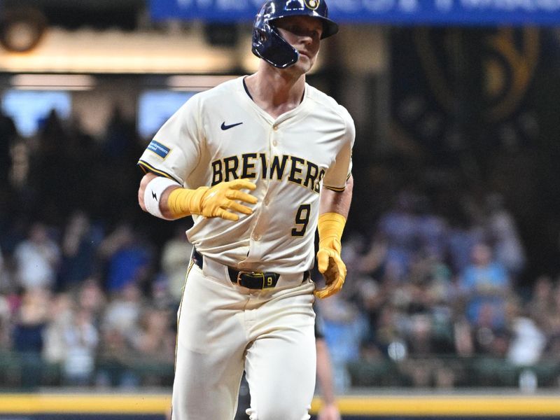 Aug 14, 2024; Milwaukee, Wisconsin, USA; Milwaukee Brewers first base Jake Bauers (9) rounds the bases after hitting a home run against the Los Angeles Dodgers in the second inning at American Family Field. Mandatory Credit: Michael McLoone-USA TODAY Sports