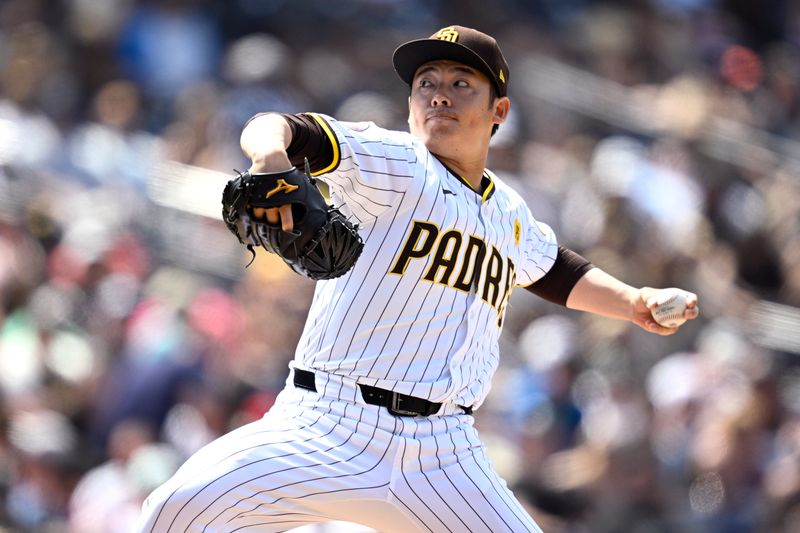 May 1, 2024; San Diego, California, USA; San Diego Padres relief pitcher Yuki Matsui (1) throws a pitch against the Cincinnati Reds during the seventh inning at Petco Park. Mandatory Credit: Orlando Ramirez-USA TODAY Sports