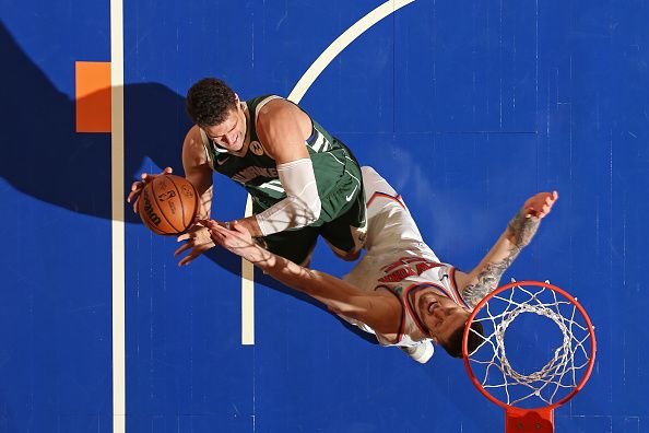 NEW YORK, NY - DECEMBER 25: Brook Lopez #11 of the Milwaukee Bucks drives to the basket during the game against the New York Knicks on December 25, 2023 at Madison Square Garden in New York City, New York.  NOTE TO USER: User expressly acknowledges and agrees that, by downloading and or using this photograph, User is consenting to the terms and conditions of the Getty Images License Agreement. Mandatory Copyright Notice: Copyright 2023 NBAE  (Photo by Nathaniel S. Butler/NBAE via Getty Images)