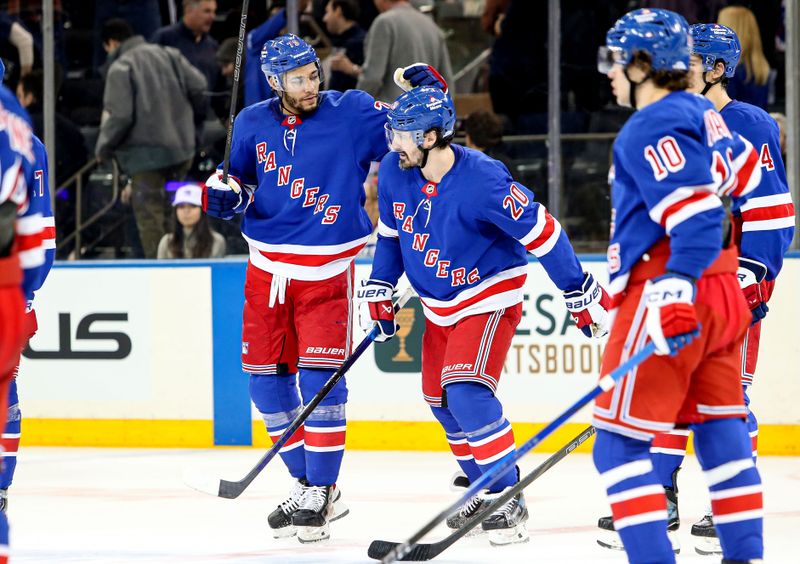 Jan 18, 2025; New York, New York, USA; New York Rangers defenseman K'Andre Miller (79) celebrates with  left wing Chris Kreider (20) after a 1-0 shootout win against the Columbus Blue Jackets at Madison Square Garden. Mandatory Credit: Danny Wild-Imagn Images