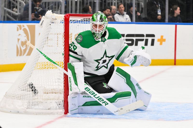 Jan 27, 2026; St. Louis, Missouri, USA; Dallas Stars goaltender Jake Oettinger (29) defends the net against the St. Louis Blues during the second period at Enterprise Center. Mandatory Credit: Jeff Curry-Imagn Images