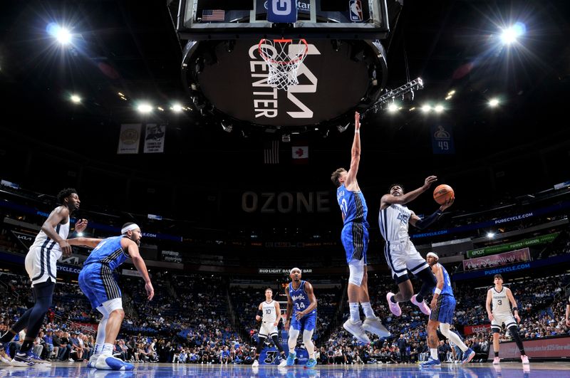 ORLANDO, FL - MARCH 30: GG Jackson #45 of the Memphis Grizzlies drives to the basket during the game against the Orlando Magic on March 30, 2024 at the Kia Center in Orlando, Florida. NOTE TO USER: User expressly acknowledges and agrees that, by downloading and or using this photograph, User is consenting to the terms and conditions of the Getty Images License Agreement. Mandatory Copyright Notice: Copyright 2024 NBAE (Photo by Fernando Medina/NBAE via Getty Images)