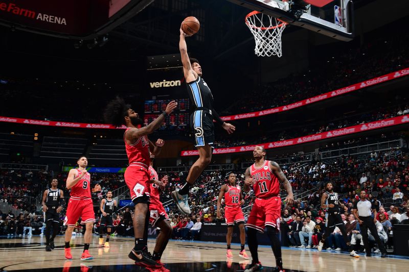 ATLANTA, GA - FEBRUARY 12: Jalen Johnson #1 of the Atlanta Hawks goes to the basket during the game on February 12, 2024 at State Farm Arena in Atlanta, Georgia.  NOTE TO USER: User expressly acknowledges and agrees that, by downloading and/or using this Photograph, user is consenting to the terms and conditions of the Getty Images License Agreement. Mandatory Copyright Notice: Copyright 2024 NBAE (Photo by Scott Cunningham/NBAE via Getty Images)