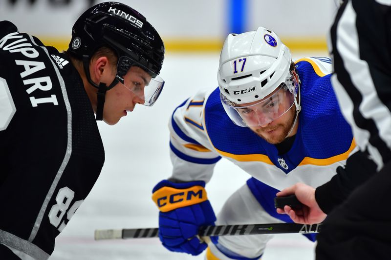 Feb 13, 2023; Los Angeles, California, USA; Buffalo Sabres center Tyson Jost (17) takes the face off against Los Angeles Kings center Rasmus Kupari (89) during the third period at Crypto.com Arena. Mandatory Credit: Gary A. Vasquez-USA TODAY Sports