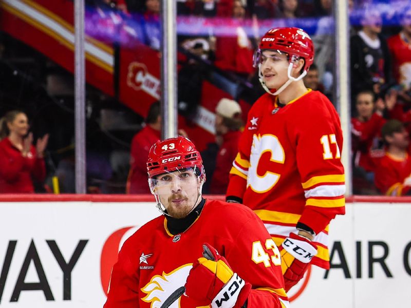 Jan 30, 2025; Calgary, Alberta, CAN; Calgary Flames right wing Adam Klapka (43) celebrates his goal against the Anaheim Ducks during the second period at Scotiabank Saddledome. Mandatory Credit: Sergei Belski-Imagn Images