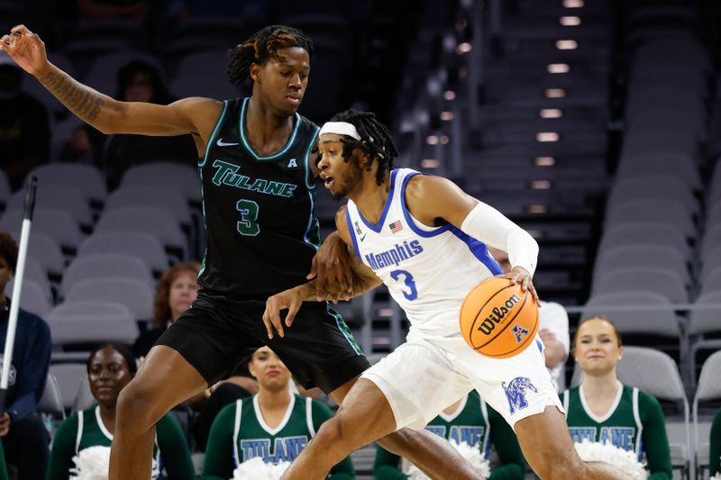 Mar 15, 2025; Fort Worth, TX, USA; Memphis Tigers guard Colby Rogers (3) controls the ball as Tulane Green Wave guard Kam Williams (3) defends during the first half at Dickies Arena. Mandatory Credit: Chris Jones-Imagn Images
