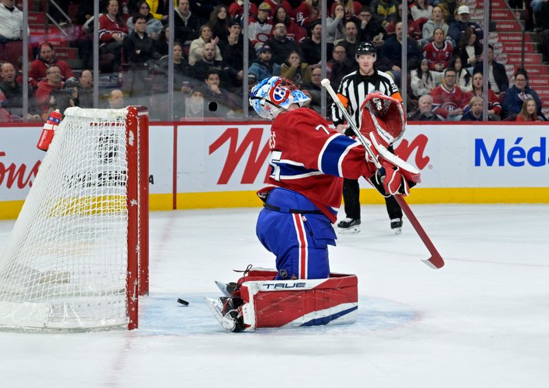 Jan 25, 2025; Montreal, Quebec, CAN; Montreal Canadiens goalie Jakub Dobes (75) reacts after allowing a goal scored by New Jersey Devils forward Jesper Bratt (not pictured) during the first period at the Bell Centre. Mandatory Credit: Eric Bolte-Imagn Images