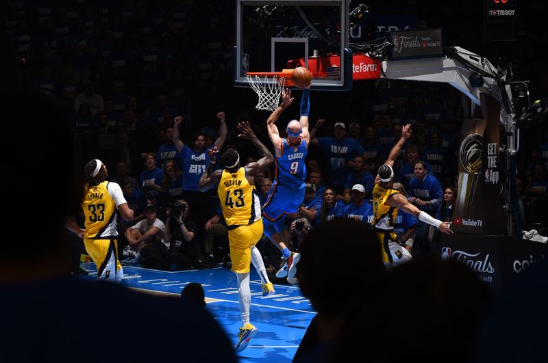 OKLAHOMA CITY, OK - JUNE 8: Alex Caruso #9 of the Oklahoma City Thunder drives to the basket during the game against the Indiana Pacers during Game One of the 2025 NBA Finals on June 8, 2025 at Paycom Center in Oklahoma City, Oklahoma. NOTE TO USER: User expressly acknowledges and agrees that, by downloading and or using this photograph, User is consenting to the terms and conditions of the Getty Images License Agreement. Mandatory Copyright Notice: Copyright 2025 NBAE (Photo byGarrett Ellwood /NBAE via Getty Images)