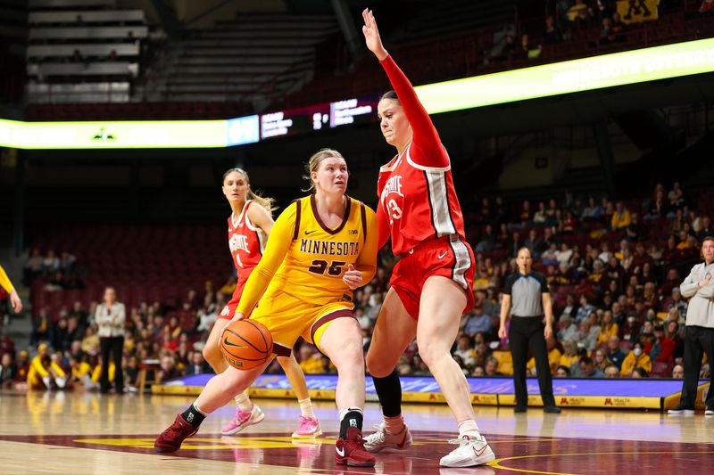 Feb 8, 2024; Minneapolis, Minnesota, USA; Minnesota Golden Gophers guard Grace Grocholski (25) works towards the basket as Ohio State Buckeyes forward Rebeka Mikulasikova (23) defends during the first half at Williams Arena. Mandatory Credit: Matt Krohn-USA TODAY Sports