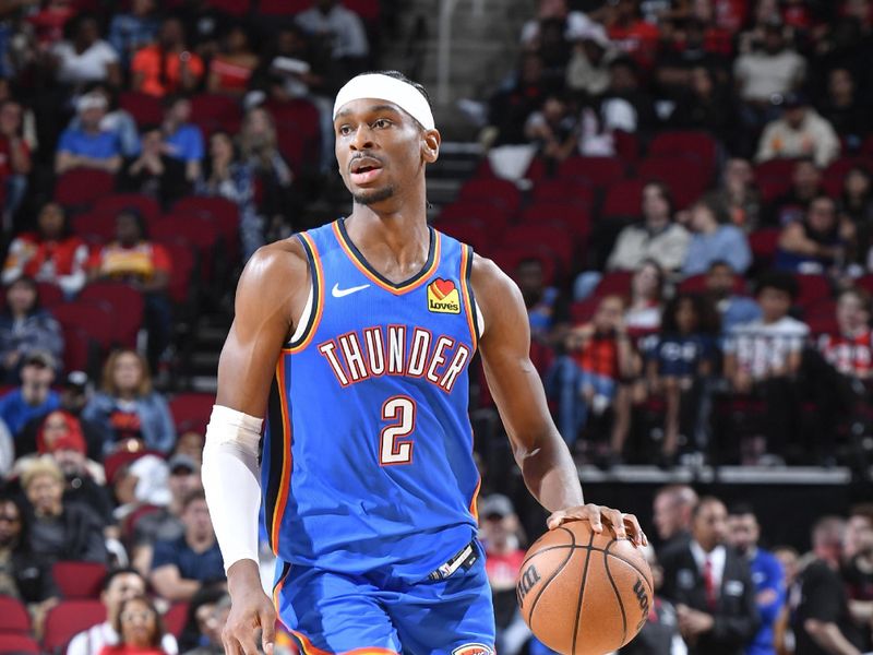 HOUSTON, TX - FEBRUARY 25:   Shai Gilgeous-Alexander #2 of the Oklahoma City Thunder handles the ball during the game  on February 25, 2024 at the Toyota Center in Houston, Texas. NOTE TO USER: User expressly acknowledges and agrees that, by downloading and or using this photograph, User is consenting to the terms and conditions of the Getty Images License Agreement. Mandatory Copyright Notice: Copyright 2024 NBAE (Photo by Logan Riely/NBAE via Getty Images)