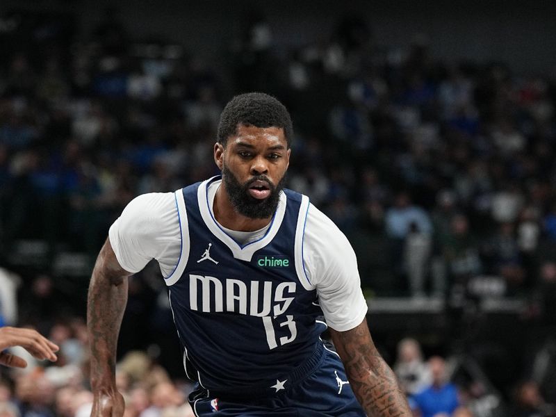 DALLAS, TX - NOVEMBER 8: Naji Marshall #13 of the Dallas Mavericks dribbles the ball during the game against the Phoenix Suns on November 6, 2024 at the American Airlines Center in Dallas, Texas. NOTE TO USER: User expressly acknowledges and agrees that, by downloading and or using this photograph, User is consenting to the terms and conditions of the Getty Images License Agreement. Mandatory Copyright Notice: Copyright 2024 NBAE (Photo by Glenn James/NBAE via Getty Images)