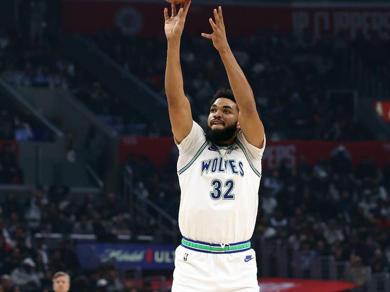 LOS ANGELES, CALIFORNIA - FEBRUARY 12: Karl-Anthony Towns #32 of the Minnesota Timberwolves attempts a three-point basket during the first quarter against the Los Angeles Clippers at Crypto.com Arena on February 12, 2024 in Los Angeles, California. NOTE TO USER: User expressly acknowledges and agrees that, by downloading and or using this photograph, user is consenting to the terms and conditions of the Getty Images License Agreement. (Photo by Katelyn Mulcahy/Getty Images)