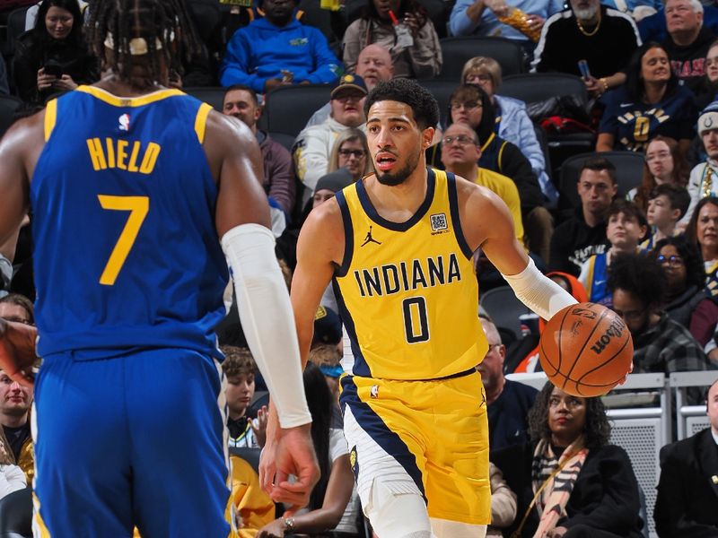 INDIANAPOLIS, IN - JANUARY 10:  Tyrese Haliburton #0 of the Indiana Pacers dribbles the ball during the game against the Golden State Warriors on January 10, 2025 at Gainbridge Fieldhouse in Indianapolis, Indiana. NOTE TO USER: User expressly acknowledges and agrees that, by downloading and or using this Photograph, user is consenting to the terms and conditions of the Getty Images License Agreement. Mandatory Copyright Notice: Copyright 2025 NBAE (Photo by Ron Hoskins/NBAE via Getty Images)