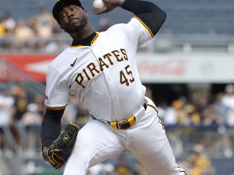 Jul 7, 2024; Pittsburgh, Pennsylvania, USA;  Pittsburgh Pirates reilef pitcher Aroldis Chapman (45) pitches against the New York Mets during the ninth inning at PNC Park.The Mets won 3-2.  Mandatory Credit: Charles LeClaire-USA TODAY Sports