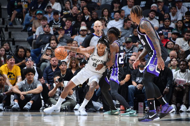 SAN ANTONIO, TX - NOVEMBER 11:  Devin Vassell #24 of the San Antonio Spurs dribbles the ball during the game against the Sacramento Kings during a regular season game on November 11, 2024 at the Frost Bank Center in San Antonio, Texas. NOTE TO USER: User expressly acknowledges and agrees that, by downloading and or using this photograph, user is consenting to the terms and conditions of the Getty Images License Agreement. Mandatory Copyright Notice: Copyright 2024 NBAE (Photos by Michael Gonzales/NBAE via Getty Images)