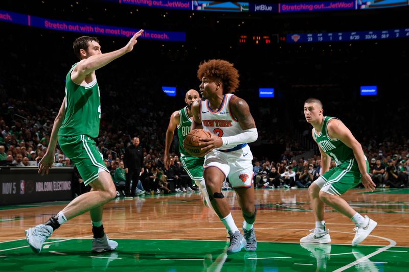 BOSTON, MA - OCTOBER 22: Miles McBride #2 of the New York Knicks drives to the basket during the game against the Boston Celtics on October 22, 2024 at TD Garden in Boston, Massachusetts. NOTE TO USER: User expressly acknowledges and agrees that, by downloading and/or using this Photograph, user is consenting to the terms and conditions of the Getty Images License Agreement. Mandatory Copyright Notice: Copyright 2024 NBAE (Photo by Brian Babineau/NBAE via Getty Images)