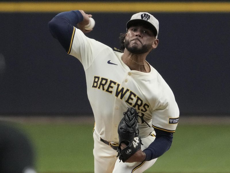 May 18, 2025; Milwaukee, Wisconsin, USA; Milwaukee Brewers pitcher Freddy Peralta (51) delivers a pitch in the first inning against the Minnesota Twins at American Family Field. Mandatory Credit: Michael McLoone-Imagn Images