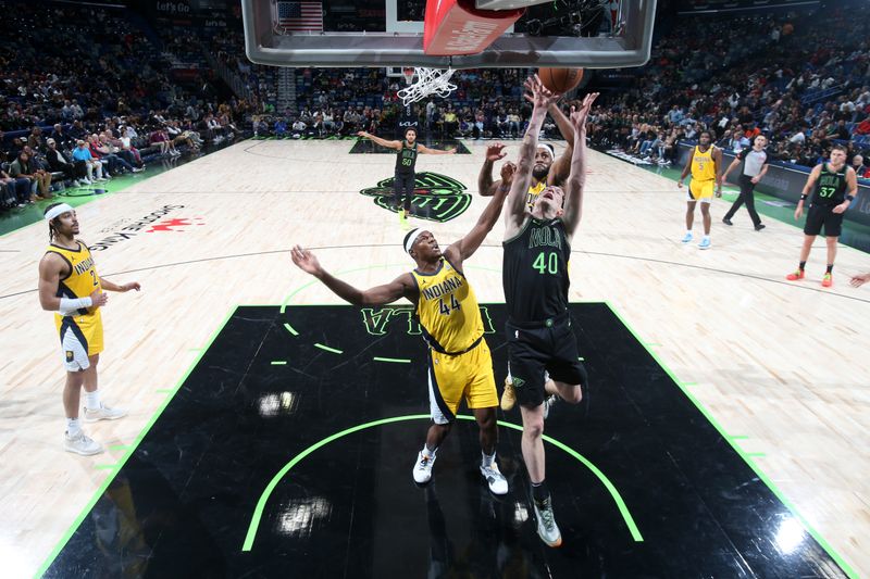 NEW ORLEANS, LA - MARCH 1:  Cody Zeller #40 of the New Orleans Pelicans grabs a rebound during the game against the Indiana Pacers on March 1, 2024 at the Smoothie King Center in New Orleans, Louisiana. NOTE TO USER: User expressly acknowledges and agrees that, by downloading and or using this Photograph, user is consenting to the terms and conditions of the Getty Images License Agreement. Mandatory Copyright Notice: Copyright 2024 NBAE (Photo by Layne Murdoch Jr./NBAE via Getty Images)