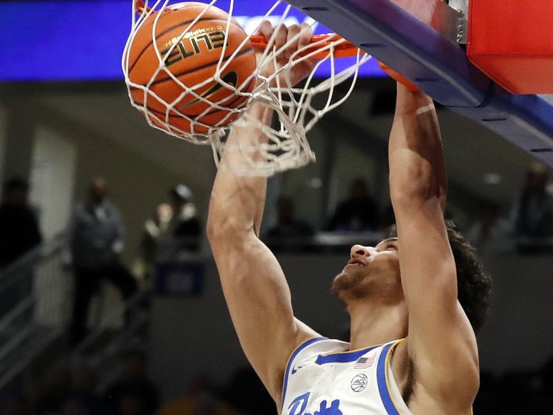 Jan 25, 2023; Pittsburgh, Pennsylvania, USA; Pittsburgh Panthers forward Nate Santos (5) dunks against the Wake Forest Demon Deacons during the first half at the Petersen Events Center. Mandatory Credit: Charles LeClaire-USA TODAY Sports