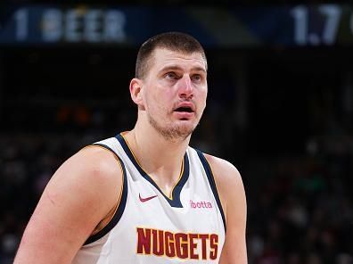 DENVER, CO - DECEMBER 25: Nikola Jokic #15 of the Denver Nuggets prepares to shoot a free throw during the game against the Golden State Warriors on December 25, 2023 at the Ball Arena in Denver, Colorado. NOTE TO USER: User expressly acknowledges and agrees that, by downloading and/or using this Photograph, user is consenting to the terms and conditions of the Getty Images License Agreement. Mandatory Copyright Notice: Copyright 2023 NBAE (Photo by Garrett Ellwood/NBAE via Getty Images)