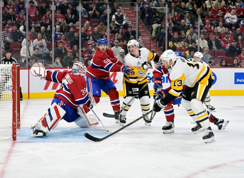 Oct 14, 2024; Montreal, Quebec, CAN; Pittsburgh Penguins forward Kevin Hayes (13) scores a goal against Montreal Canadiens goalie Sam Montembeault (35) during the third period at the Bell Centre. Mandatory Credit: Eric Bolte-Imagn Images