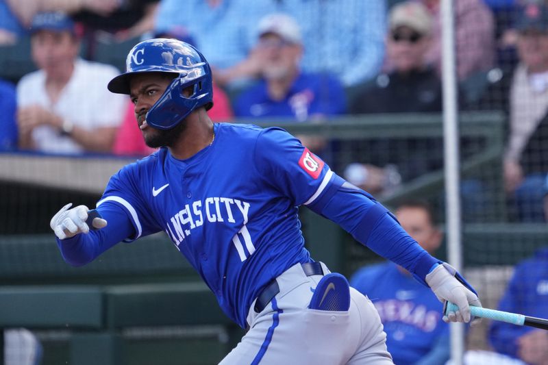 Mar 8, 2024; Surprise, Arizona, USA; Kansas City Royals third baseman Maikel Garcia (11) bats against the Texas Rangers during the first inning at Surprise Stadium. Mandatory Credit: Joe Camporeale-USA TODAY Sports