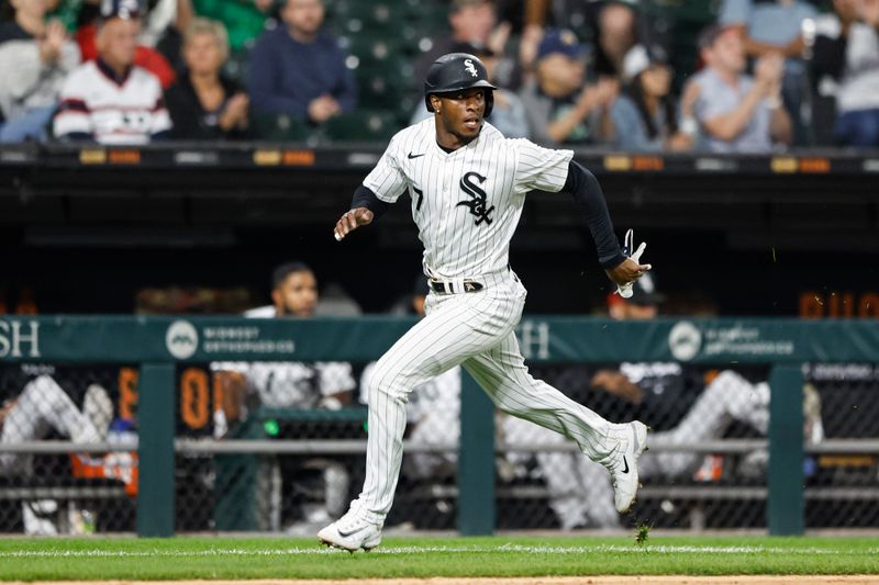 Sep 16, 2023; Chicago, Illinois, USA; Chicago White Sox shortstop Tim Anderson (7) runs to score against the Minnesota Twins during the seventh inning at Guaranteed Rate Field. Mandatory Credit: Kamil Krzaczynski-USA TODAY Sports