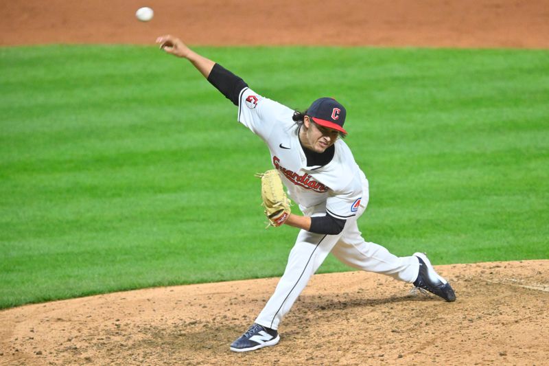 Apr 10, 2024; Cleveland, Ohio, USA; Cleveland Guardians pitcher Eli Morgan (49) delivers a pitch in the tenth inning against the Chicago White Sox at Progressive Field. Mandatory Credit: David Richard-USA TODAY Sports