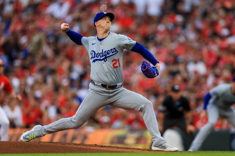 May 25, 2024; Cincinnati, Ohio, USA; Los Angeles Dodgers starting pitcher Walker Buehler (21) pitches against the Cincinnati Reds in the first inning at Great American Ball Park. Mandatory Credit: Katie Stratman-USA TODAY Sports