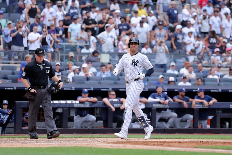 Jul 22, 2024; Bronx, New York, USA; New York Yankees right fielder Juan Soto (22) rounds the bases after hitting a solo home run against the Tampa Bay Rays during the seventh inning at Yankee Stadium. Mandatory Credit: Brad Penner-USA TODAY Sports