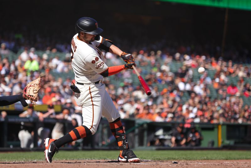 Sep 13, 2023; San Francisco, California, USA; San Francisco Giants third baseman J.D. Davis (7) hits a three run home run during the eighth inning against the Cleveland Guardians at Oracle Park. Mandatory Credit: Sergio Estrada-USA TODAY Sports