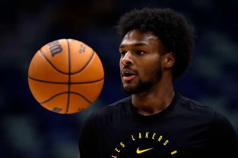 NEW ORLEANS, LOUISIANA - NOVEMBER 16: Bronny James #9 of the Los Angeles Lakers warms up prior to the start of an NBA game against the New Orleans Pelicans at Smoothie King Center on November 16, 2024 in New Orleans, Louisiana. NOTE TO USER: User expressly acknowledges and agrees that, by downloading and or using this photograph, User is consenting to the terms and conditions of the Getty Images License Agreement. (Photo by Sean Gardner/Getty Images)