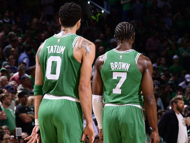 BOSTON, MA - MAY 14: Jayson Tatum #0 and Jaylen Brown #7 of the Boston Celtics look on during the game against the Philadelphia 76ers during the Eastern Conference Semi-Finals of the 2023 NBA Playoffs on May 14, 2023 at the TD Garden in Boston, Massachusetts. NOTE TO USER: User expressly acknowledges and agrees that, by downloading and or using this photograph, User is consenting to the terms and conditions of the Getty Images License Agreement. Mandatory Copyright Notice: Copyright 2023 NBAE  (Photo by Brian Babineau/NBAE via Getty Images)