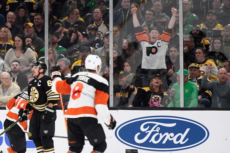 Mar 16, 2024; Boston, Massachusetts, USA; Philadelphia Flyers fan reacts after a goal during the third period against the Boston Bruins at TD Garden. Mandatory Credit: Bob DeChiara-USA TODAY Sports