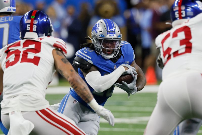 Detroit Lions running back Jahmyr Gibbs rushes during the first half of an NFL preseason football game against the New York Giants, Friday, Aug. 11, 2023, in Detroit. (AP Photo/Duane Burleson)