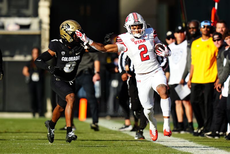 Nov 26, 2022; Boulder, Colorado, USA; Colorado Buffaloes cornerback Nikko Reed (6) pushes Utah Utes running back Micah Bernard (2) out of bounds in the first quarter at Folsom Field. Mandatory Credit: Ron Chenoy-USA TODAY Sports