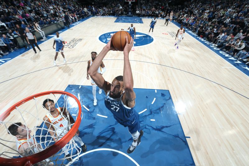 MINNEAPOLIS, MN -  APRIL 12: Rudy Gobert #27 of the Minnesota Timberwolves dunks the ball during the game against the Atlanta Hawks on April 12, 2024 at Target Center in Minneapolis, Minnesota. NOTE TO USER: User expressly acknowledges and agrees that, by downloading and or using this Photograph, user is consenting to the terms and conditions of the Getty Images License Agreement. Mandatory Copyright Notice: Copyright 2024 NBAE (Photo by David Sherman/NBAE via Getty Images)