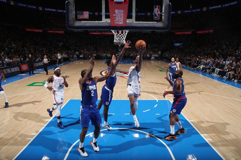 OKLAHOMA CITY, OK - FEBRUARY 22:  Shai Gilgeous-Alexander #2 of the Oklahoma City Thunder drives to the basket during the game against the LA Clippers on February 22, 2024 at Paycom Arena in Oklahoma City, Oklahoma. NOTE TO USER: User expressly acknowledges and agrees that, by downloading and or using this photograph, User is consenting to the terms and conditions of the Getty Images License Agreement. Mandatory Copyright Notice: Copyright 2024 NBAE (Photo by Zach Beeker/NBAE via Getty Images)