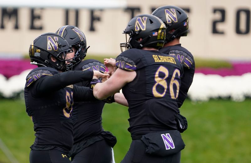 Oct 28, 2023; Evanston, Illinois, USA; Northwestern Wildcats place kicker Jack Olsen (left) celebrate a field goal against the Maryland Terrapins during the second half at Ryan Field. Mandatory Credit: David Banks-USA TODAY Sports