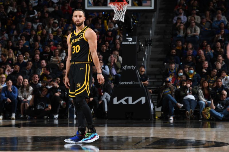 SAN FRANCISCO, CA - MARCH 7:  Stephen Curry #30 of the Golden State Warriors looks on during the game against the Chicago Bulls on March 7, 2024 at Chase Center in San Francisco, California. NOTE TO USER: User expressly acknowledges and agrees that, by downloading and or using this photograph, user is consenting to the terms and conditions of Getty Images License Agreement. Mandatory Copyright Notice: Copyright 2024 NBAE (Photo by Noah Graham/NBAE via Getty Images)