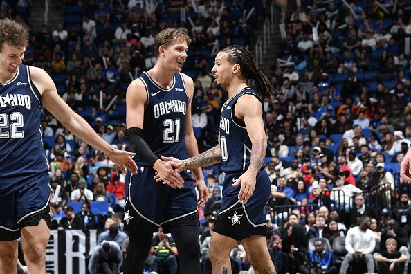 ORLANDO, FL - DECEMBER 8: Cole Anthony #50 of the Orlando Magic celebrates with Franz Wagner #22 and Moritz Wagner #21 during the game against the Detroit Pistons on December 8, 2023 at Amway Center in Orlando, Florida. NOTE TO USER: User expressly acknowledges and agrees that, by downloading and or using this photograph, User is consenting to the terms and conditions of the Getty Images License Agreement. Mandatory Copyright Notice: Copyright 2023 NBAE (Photo by Fernando Medina/NBAE via Getty Images)