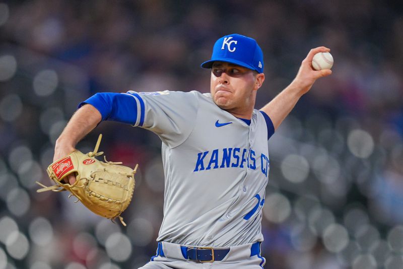 May 28, 2024; Minneapolis, Minnesota, USA; Kansas City Royals assistant hitting coach Keoni DeRenne (77) pitches against the Minnesota Twins in the eighth inning at Target Field. Mandatory Credit: Brad Rempel-USA TODAY Sports