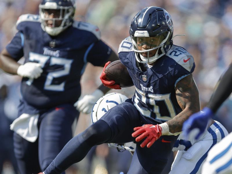 Tennessee Titans running back Tony Pollard (20) runs for a touchdown during the second half of an NFL football game against the Indianapolis Colts, Sunday, Oct. 13, 2024, in Nashville, Tenn. (AP Photo/Stew Milne)