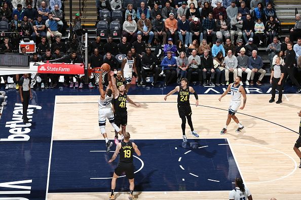 MINNEAPOLIS, MN - NOVEMBER 30: Rudy Gobert #27 of the Minnesota Timberwolves drives to the basket during the game against the Utah Jazz on November 30, 2023 at Target Center in Minneapolis, Minnesota. NOTE TO USER: User expressly acknowledges and agrees that, by downloading and or using this Photograph, user is consenting to the terms and conditions of the Getty Images License Agreement. Mandatory Copyright Notice: Copyright 2023 NBAE (Photo by David Sherman/NBAE via Getty Images)