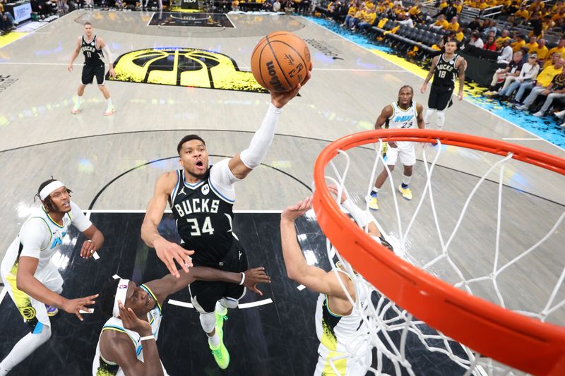 INDIANAPOLIS, IN- APRIL 19: Giannis Antetokounmpo #34 of the Milwaukee Bucks drives to the basket during the game against the Indiana Pacers during Round One Game One of the 2025 NBA Playoffs on April 19, 2025 at Gainbridge Fieldhouse in Indianapolis, Indiana. NOTE TO USER: User expressly acknowledges and agrees that, by downloading and or using this photograph, User is consenting to the terms and conditions of the Getty Images License Agreement. Mandatory Copyright Notice: Copyright 2025 NBAE (Photo by Jeff Haynes/NBAE via Getty Images)