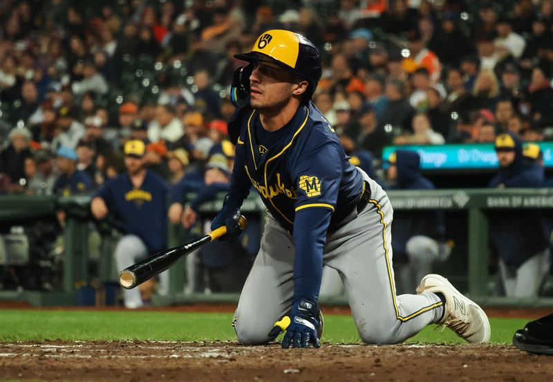 Sep 12, 2024; San Francisco, California, USA; Milwaukee Brewers right fielder Sal Frelick (10) on the ground after avoiding a pitch against the San Francisco Giants during the seventh inning at Oracle Park. Mandatory Credit: Kelley L Cox-Imagn Images