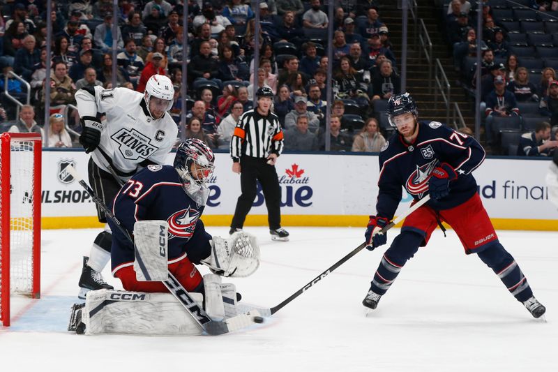Mar 9, 2026; Columbus, Ohio, USA; Columbus Blue Jackets goalie Jet Greaves (73) makes a stick save as Los Angeles Kings center Anze Kopitar (11) looks for a rebound during the first period at Nationwide Arena. Mandatory Credit: Russell LaBounty-Imagn Images